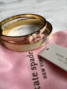 kate spade gold-tone bangles with blush enamel bow